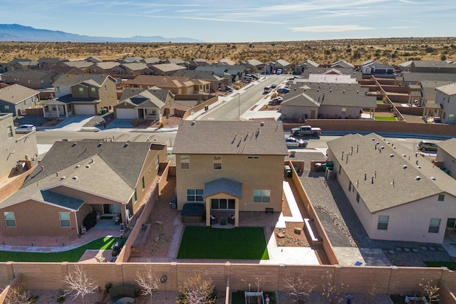 aerial view with a mountain view and a residential view