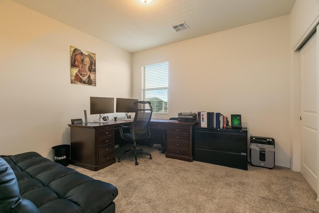 home office featuring light carpet and visible vents