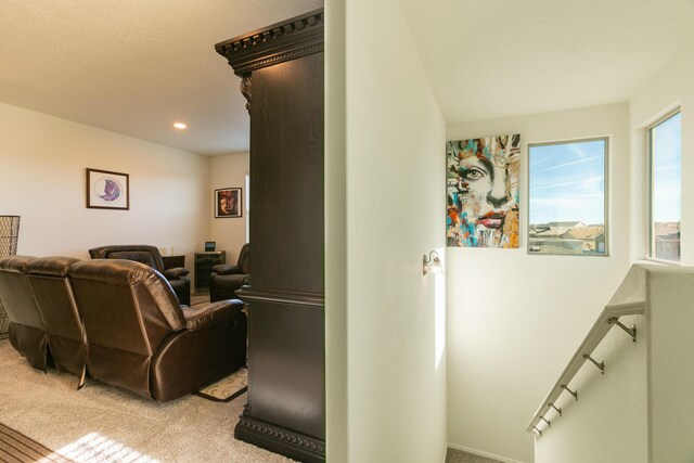 interior space with light carpet and recessed lighting