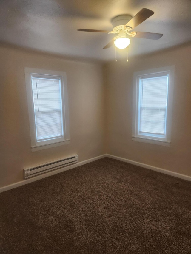 unfurnished room featuring carpet, a baseboard heating unit, and ceiling fan