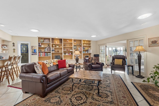 living room featuring light tile patterned flooring