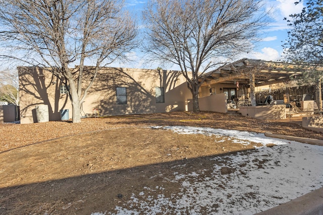 view of front facade featuring a pergola