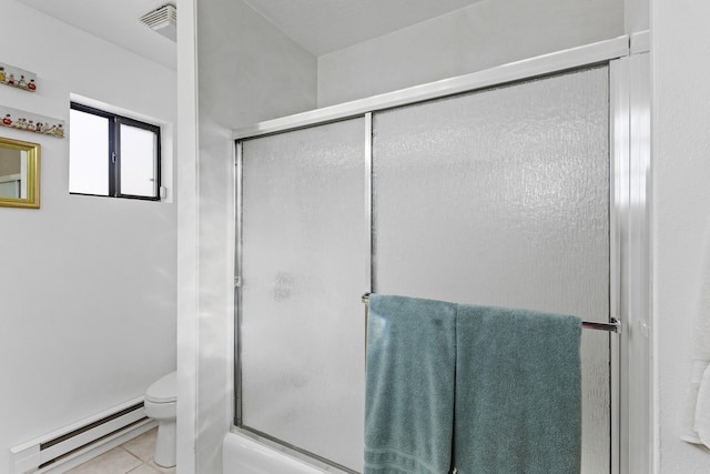 bathroom featuring tile patterned flooring, a baseboard heating unit, an enclosed shower, and toilet