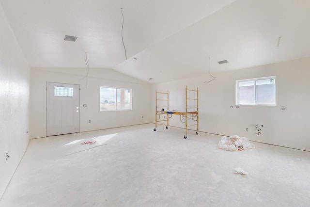 interior space featuring lofted ceiling