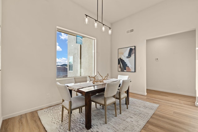 dining room featuring light hardwood / wood-style floors