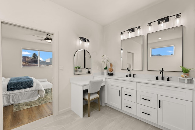 bathroom featuring vanity and ceiling fan