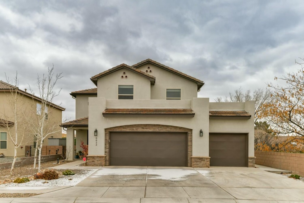 view of front of property featuring a garage