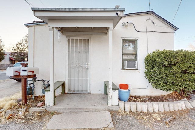 view of exterior entry with cooling unit