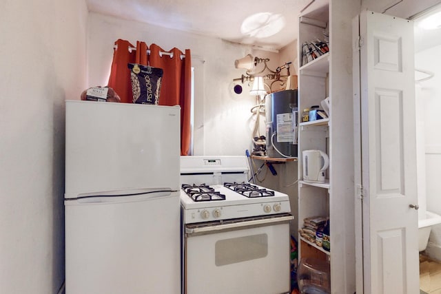 kitchen with white appliances and gas water heater