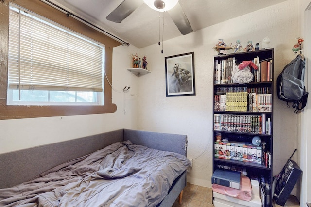 bedroom featuring ceiling fan