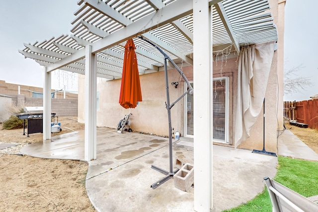 view of patio with a pergola and grilling area