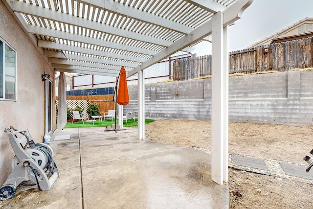 view of patio / terrace featuring a pergola