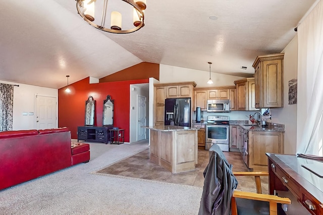 kitchen featuring a center island, light carpet, dark stone countertops, appliances with stainless steel finishes, and pendant lighting