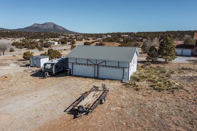 exterior space featuring a mountain view