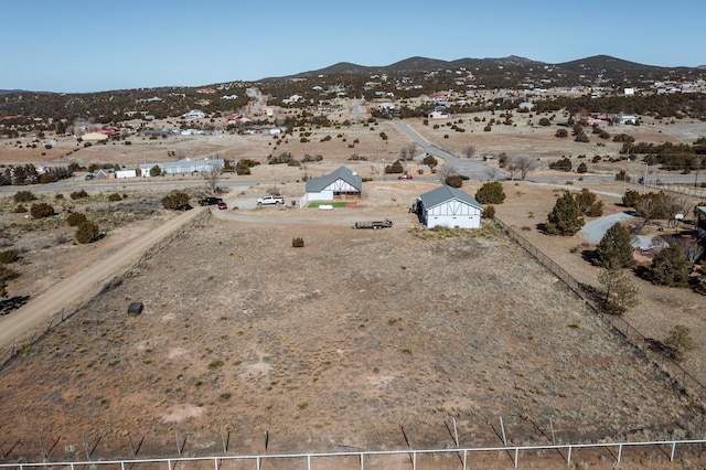 bird's eye view with a mountain view and a rural view