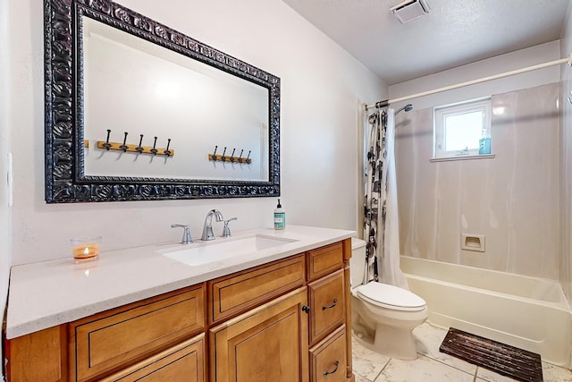 full bathroom with shower / bath combination with curtain, vanity, and toilet