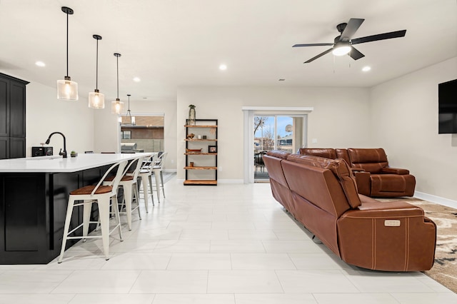 living room with ceiling fan