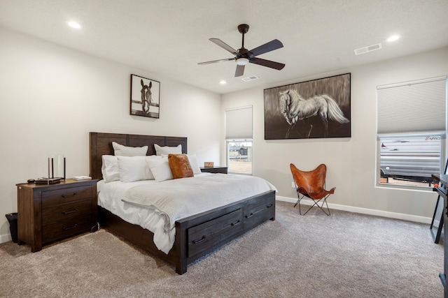 carpeted bedroom with ceiling fan