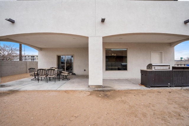 back of house with a patio area