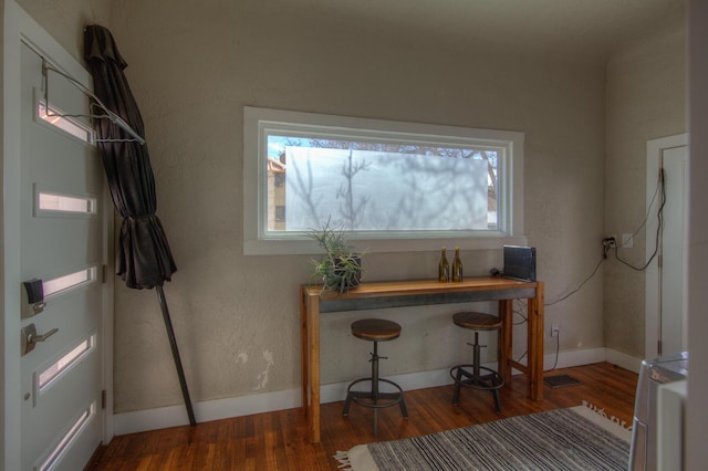 home office featuring dark wood-type flooring