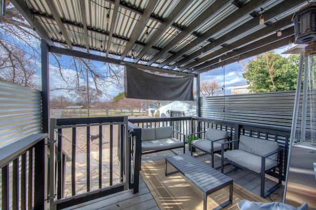 wooden deck with outdoor lounge area