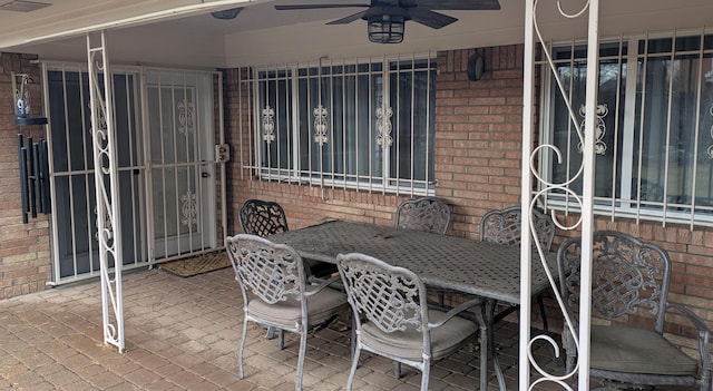 view of patio with ceiling fan