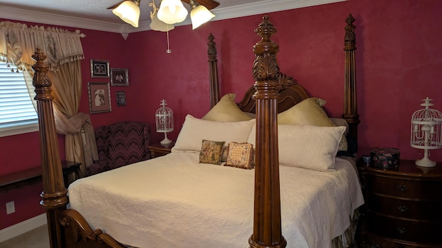 bedroom featuring crown molding and ceiling fan