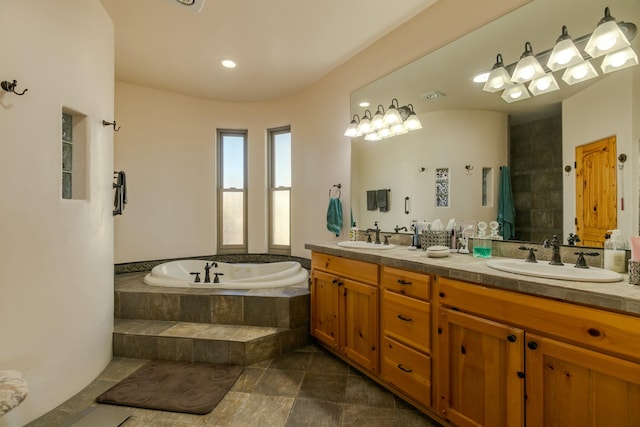6816 Nagoya Rd NE, Rio Rancho, NM 87144 - bathroom featuring vanity and tiled tub