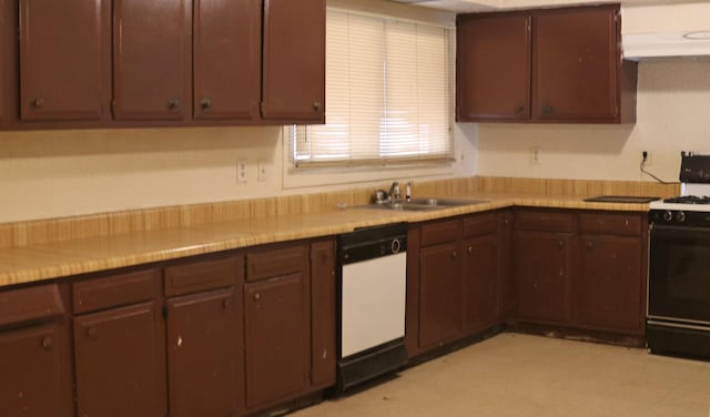 kitchen featuring dark brown cabinets, dishwasher, sink, and range with gas cooktop