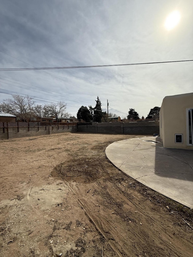 view of yard with a patio area