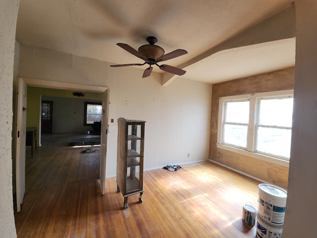 unfurnished room featuring hardwood / wood-style flooring and ceiling fan