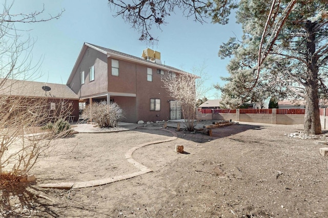 rear view of house featuring a patio area