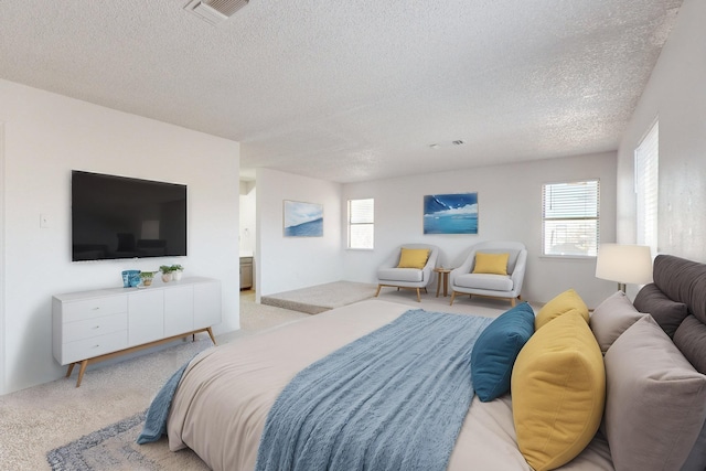 carpeted bedroom with a textured ceiling