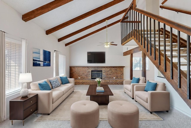 living room featuring light carpet, beam ceiling, high vaulted ceiling, and a brick fireplace