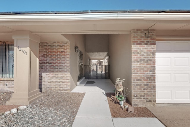 entrance to property featuring a garage