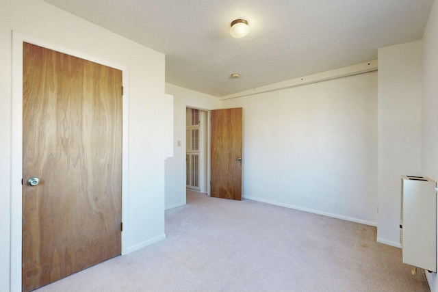 carpeted bedroom featuring a closet