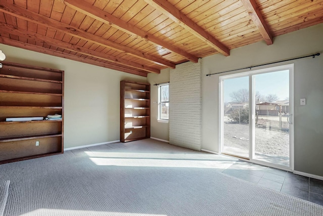 unfurnished living room with carpet flooring, beam ceiling, and wooden ceiling