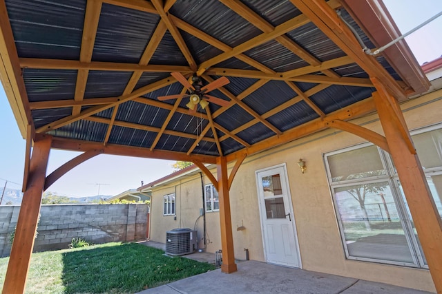 view of patio / terrace featuring a gazebo, ceiling fan, and central air condition unit