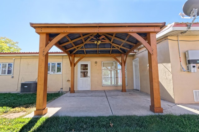 entrance to property featuring central AC and a patio area