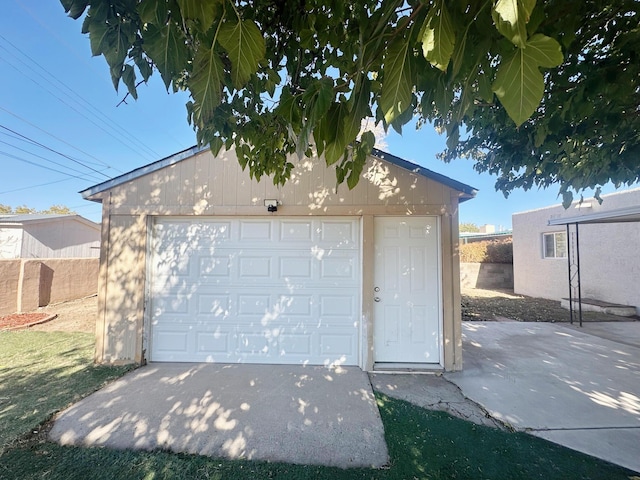 detached garage with fence