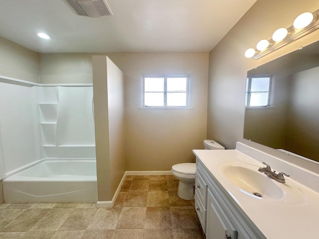 bathroom with a healthy amount of sunlight, baseboards, visible vents, and toilet