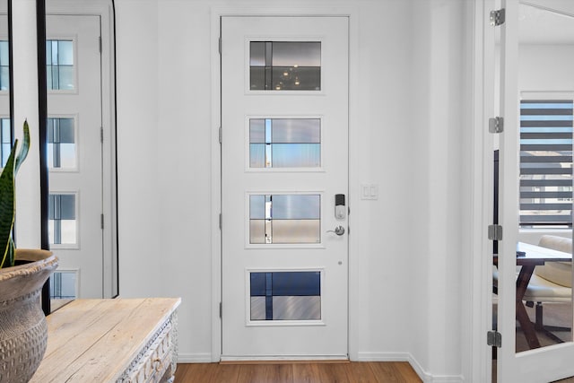 foyer with light hardwood / wood-style flooring