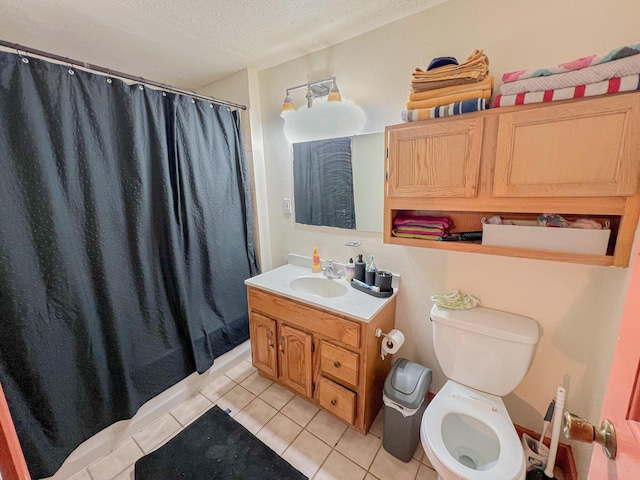 full bathroom featuring shower / tub combo with curtain, vanity, a textured ceiling, tile patterned floors, and toilet