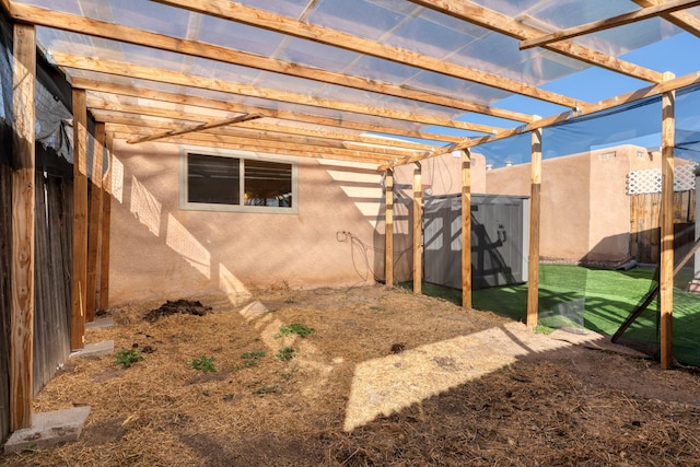 exterior space with a pergola