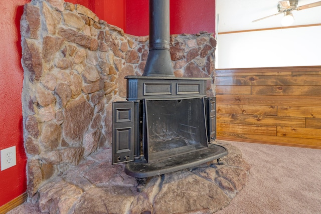 room details with ceiling fan and carpet flooring