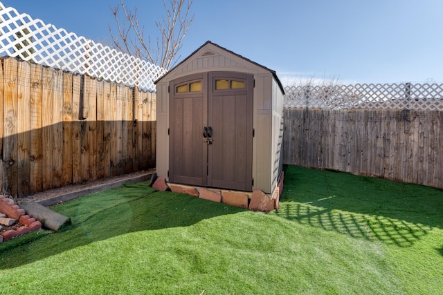 view of outbuilding featuring a lawn