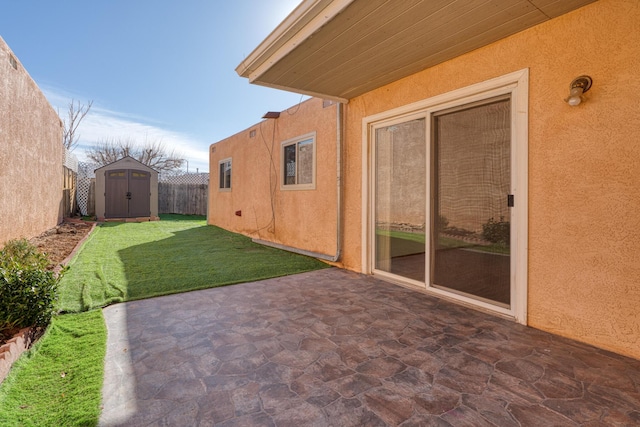 view of patio / terrace with a storage unit