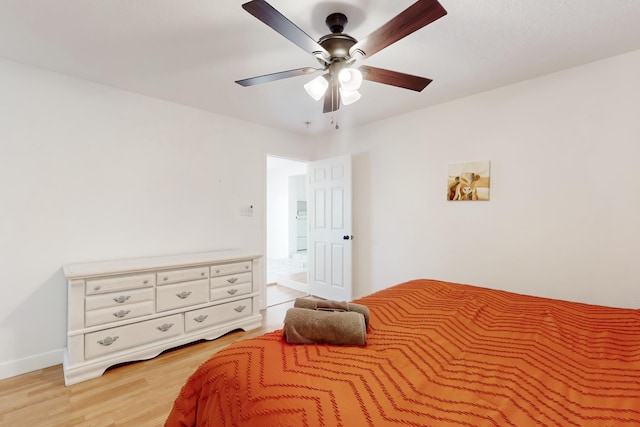 bedroom featuring ceiling fan and light wood-type flooring