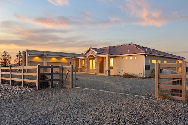 view of front of property featuring a garage