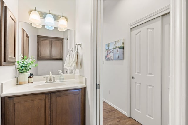 bathroom featuring vanity and hardwood / wood-style floors